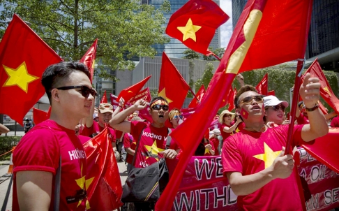 Vietnamese people march in Hong Kong to protest against China’s wrongful actions